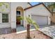 Charming single-story home featuring a two-car garage and desert landscaping at 3609 Blue Pimpernel Ave, North Las Vegas, NV 89081