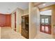 Open kitchen with stainless steel appliances, granite countertops, and tile flooring at 3609 Blue Pimpernel Ave, North Las Vegas, NV 89081