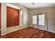 Open-concept living room with hardwood floors and neutral paint at 3609 Blue Pimpernel Ave, North Las Vegas, NV 89081