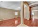 Open-concept living room with hardwood floors and neutral paint at 3609 Blue Pimpernel Ave, North Las Vegas, NV 89081