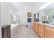 Spacious bathroom featuring a soaking tub, walk-in shower and double vanity at 4116 Villa Flora St, Las Vegas, NV 89130