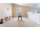 Spacious game room featuring a foosball table and elegant chandelier lighting at 4116 Villa Flora St, Las Vegas, NV 89130