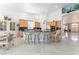 Modern kitchen with sleek countertops, stainless steel appliances, and breakfast bar seating at 4116 Villa Flora St, Las Vegas, NV 89130