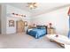 Tranquil primary bedroom featuring neutral carpet, elegant furniture, and direct views of the pool area at 4116 Villa Flora St, Las Vegas, NV 89130