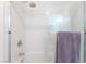 Modern shower with frameless glass doors, updated fixtures, and a calming, spa-like aesthetic at 4116 Villa Flora St, Las Vegas, NV 89130