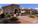 Charming single-story home featuring a tile roof and desert landscaping at 5005 Wild Thyme Ave, Las Vegas, NV 89131
