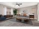 Staged bedroom featuring modern furniture, stylish decor, neutral walls, soft carpeting, and natural light at 531 Coolidge Ave, Henderson, NV 89015
