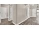 Hallway featuring wood-look floors, and multiple doors leading to other rooms at 531 Coolidge Ave, Henderson, NV 89015