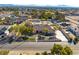 Drone shot of a single-story home with a large lot and desert landscaping at 5340 N Campbell Rd, Las Vegas, NV 89149