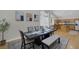 Bright dining room features modern decor, seating for six, and an adjacent kitchen at 5512 Goldbrush St, Las Vegas, NV 89130