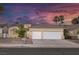 Charming single-story home featuring a desert-landscaped yard, and a spacious two-car garage at 5512 Goldbrush St, Las Vegas, NV 89130