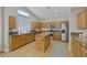 Well-equipped kitchen featuring stainless steel appliances and a functional center island at 5512 Goldbrush St, Las Vegas, NV 89130