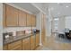 Well-appointed kitchen area with granite counters and ample storage space at 5512 Goldbrush St, Las Vegas, NV 89130