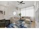 Bright living room with modern furnishings, neutral tones and a decorative area rug at 5512 Goldbrush St, Las Vegas, NV 89130