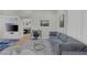 Spacious living room with modern decor, comfortable seating, and seamless flow to other rooms at 5512 Goldbrush St, Las Vegas, NV 89130