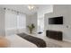 A bright main bedroom flows into a bathroom with a soaking tub at 5512 Goldbrush St, Las Vegas, NV 89130