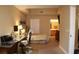 Cozy bedroom with work space, offering a functional layout, and ample natural light for productivity and relaxation at 63 E Agate Ave # 202, Las Vegas, NV 89123