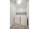 Bright laundry room with modern, matching washer and dryer units at 6460 Raven Hall St, North Las Vegas, NV 89084