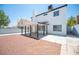 The backyard features a covered patio and a gravel section at 6524 Rain Forest Dr, Las Vegas, NV 89108