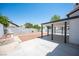 Backyard with covered patio and a landscaped area, perfect for outdoor living at 6524 Rain Forest Dr, Las Vegas, NV 89108