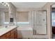 Bright bathroom features a large soaking tub and separate glass-enclosed shower at 68 Vista Del Mar St, Henderson, NV 89012