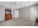 Large bedroom with neutral carpet and furnishings at 68 Vista Del Mar St, Henderson, NV 89012