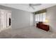Bedroom featuring neutral walls and plush carpeting with attached ensuite bathroom at 68 Vista Del Mar St, Henderson, NV 89012