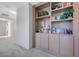 Built-in shelving unit with books and decorative items, enhancing the home's character at 68 Vista Del Mar St, Henderson, NV 89012