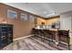 Spacious kitchen with wood floors, stainless steel appliances and bar seating at 68 Vista Del Mar St, Henderson, NV 89012
