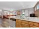 Kitchen island with stainless steel dishwasher, double sink, and granite countertop at 68 Vista Del Mar St, Henderson, NV 89012