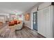 Cozy living room with sliding glass door, shutters, and an open floor plan at 68 Vista Del Mar St, Henderson, NV 89012