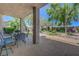 Spacious covered patio with nice stone pillars and landscaped backyard at 68 Vista Del Mar St, Henderson, NV 89012