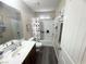 Bathroom featuring a single sink vanity and a bathtub with a shower curtain at 6922 Majestic Palm Dr, Las Vegas, NV 89122