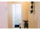 Bathroom featuring a white toilet, sink, decor and mirror at 6922 Majestic Palm Dr, Las Vegas, NV 89122