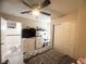 Bedroom with a ceiling fan, a comfortable bed, and a closet, and a view into the hallway at 6922 Majestic Palm Dr, Las Vegas, NV 89122