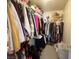 Walk-in closet features a variety of organized clothes, shelves, and storage solutions at 6922 Majestic Palm Dr, Las Vegas, NV 89122