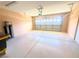 This garage features epoxy floors, overhead lighting, and a finished door at 6922 Majestic Palm Dr, Las Vegas, NV 89122