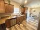Kitchen with stainless steel appliances, a window and view to the dining area at 6922 Majestic Palm Dr, Las Vegas, NV 89122