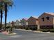 Palm Creek homes with desert landscaping, tile roofs, and neutral color palettes line a quiet street at 6922 Majestic Palm Dr, Las Vegas, NV 89122
