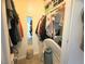 A walk-in closet providing ample storage space for clothes and other personal items at 6922 Majestic Palm Dr, Las Vegas, NV 89122