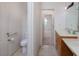 Bathroom with vanity, toilet, and tiled floor at 693 Hagens Aly, Mesquite, NV 89027