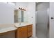 Bathroom includes a vanity, toilet, and shower with glass door at 693 Hagens Aly, Mesquite, NV 89027