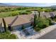 Beautiful single-story home with a two-car garage, lovely landscaping, and stunning golf course views at 693 Hagens Aly, Mesquite, NV 89027