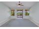 Light-filled living room with access to outdoor patio through sliding glass doors at 693 Hagens Aly, Mesquite, NV 89027