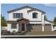 Stunning two-story home with a stylish archway entrance and three-car garage at 7708 Serenity Bay Ln # Lot 135, North Las Vegas, NV 89084