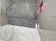 Luxurious bathroom featuring a jetted bathtub with designer tile at 7952 Lonette Ave, Las Vegas, NV 89147