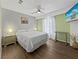 Bright bedroom featuring a neutral color palette, and modern flooring at 7952 Lonette Ave, Las Vegas, NV 89147