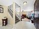 Open floor plan showing living room with staircase at 7952 Lonette Ave, Las Vegas, NV 89147