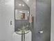 Stylish powder room featuring vessel sink, decorative mirror and gray colored walls, providing a touch of elegance at 7952 Lonette Ave, Las Vegas, NV 89147