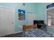 Bedroom with blue walls and carpeted floors at 8213 Cabin Springs Ave, Las Vegas, NV 89131